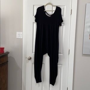 Black jumpsuit with harem pant detail